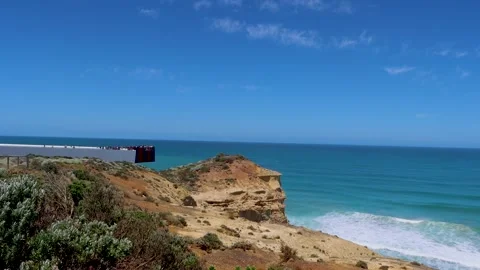People observing from the viewing deck at the Twelve Apostles Stock Footage 292498122