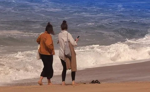 People by the ocean Foto stock