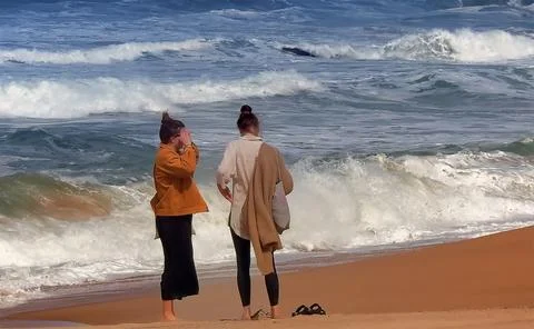 People by the ocean Foto stock