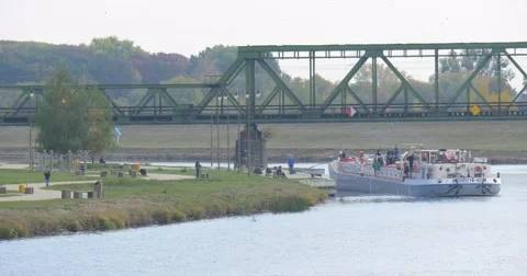 People at The Odra River Ship is Floating Slowly Along the River Bank Ship With Stock Footage 56969596