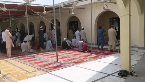 People offering friday prayers in the mosque. 動画素材 247700910