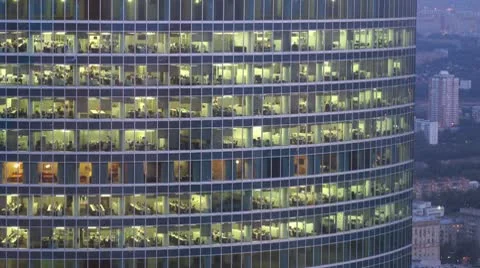 People in office-skyscraper windows do the work Stock Footage 10681282