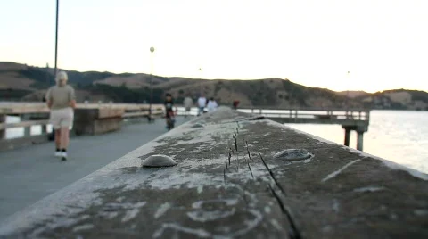 People on old dock Stock Footage 844137