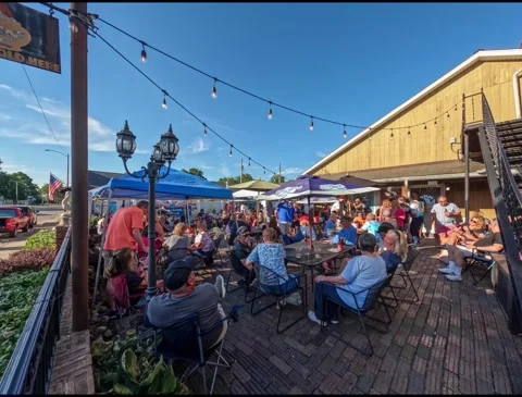 People at an outside bar time lapse Stock Footage 229651177