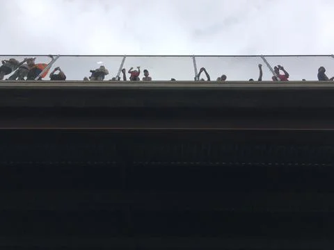 People on an overpass above train tracks waiting for the Union Pacific Big Boy Stock Photos
