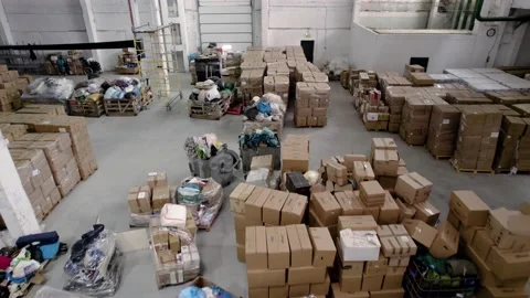 People pack and sort humanitarian aid for refugees Video stock 204017274