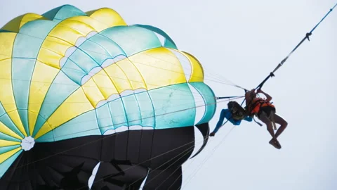 People on a parachute overhead Stock Footage 204030607