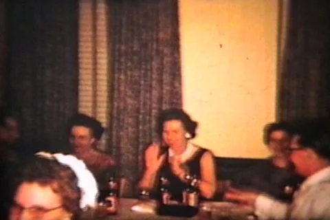 People At A Party (1960 Vintage 8mm film) Stock Footage