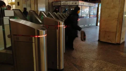 People pass through the security turnstile in the subway Stock-Footage 188541730
