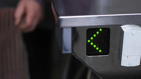 People pass through the turnstile Stock Footage 85744133