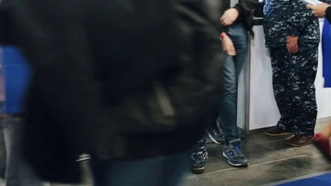 People pass through a turnstile to work Stock Footage 80982317