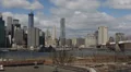 People Passing Brooklyn Bridge Heights Park New York City, Freedom Tower Skyline HD Footage