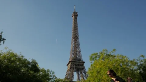 People passing the Eiffel Tower view from the Avenue Joseph-Bouvard Stock Footage 95866908