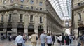 People Passing Historic Famous Duomo Square Milan Italy Skyline Shopping Stores HD Footage