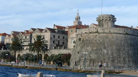 People passing by Old Tower Stock-Footage 54903443
