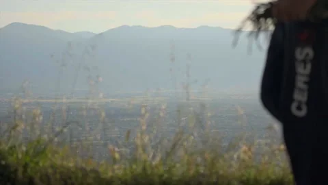 People passing over the hillside Stock Footage 168471228