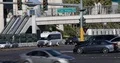 People Passing on Pedestrian Bridge and Cars Traffic Jam on Busy Las Vegas Strip 4k or 4k+ Resolution