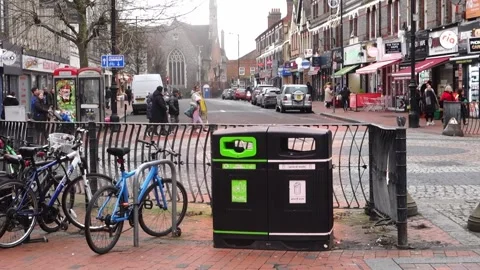 People passing by in Reading town centre Stock Footage 296565384