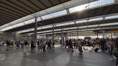 People passing through Munich HBF train station Stock Footage 249352233