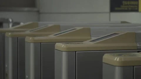 People passing through subway ticket gates in Seoul Stock Footage 332643983