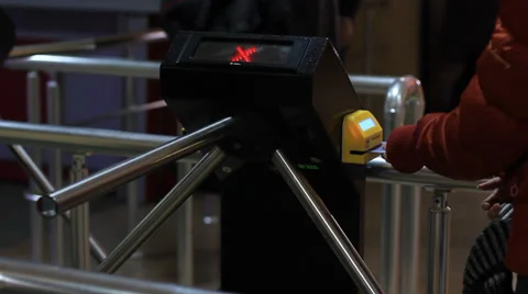 People passing turnstile Stock Footage 35602859