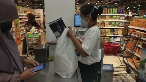 People pay at the checkout. Video stock 149807371