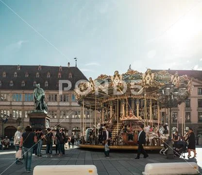 People pedestrians visitors enjoying the city of Strasbourg Stock Photos