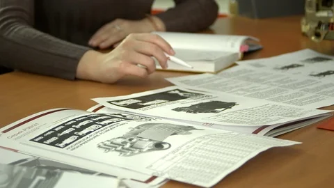 People with pens by the office table close up view Stock-Footage 101050106