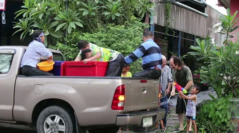 People In A Pick Up Truck Getting Sprayed During Songkran Festival 스톡 동영상 22766813