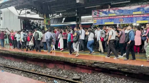 People on the platform during rush hour at railway station. Stock Footage 246921849