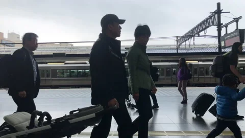 People on platform at Kyoto Station Stock Footage