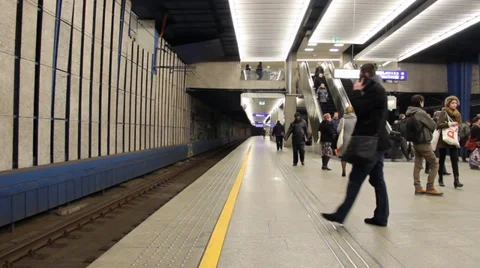 People at the platform of the main, central train station in Warsaw, Poland. Stock Footage
