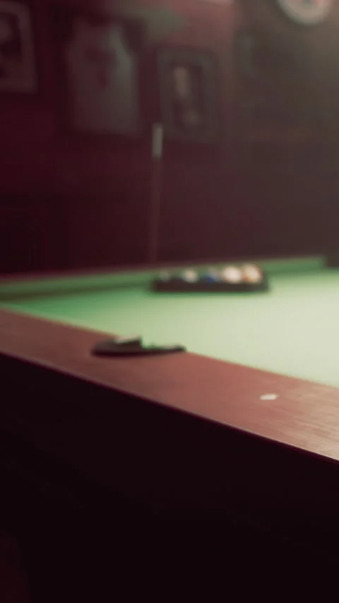 People play billiards in a bar during evening hours after work Stock Footage 337995615