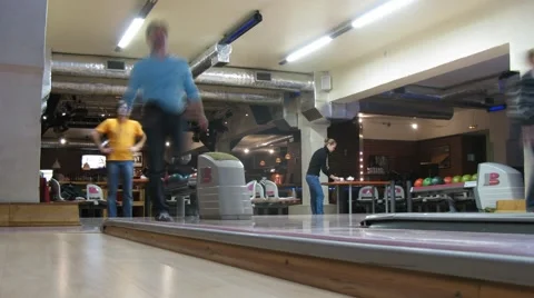 People play bowling in The First club Stock Footage