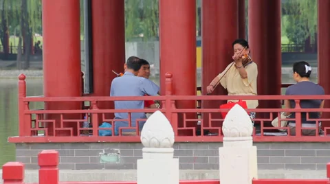 People play musical instruments in the park, Xi'an, china. Stock Footage 37247368