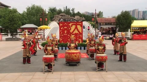 People play traditional drum instruments in the Datang Furong Garden. Stock Footage 66801609
