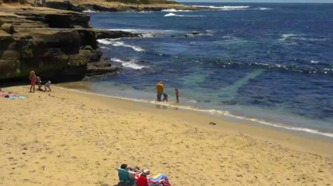 People Playing on Beach Stock Footage 37695129