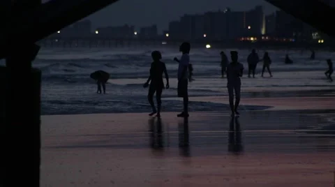 People Playing On Beach At Sundown Stock Footage 53232753