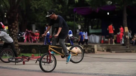People playing BMX bikes Stock Footage 253369693