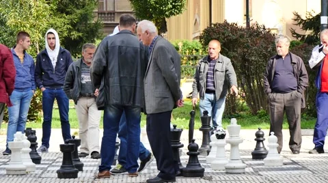 People playing  chees with big figures on street Video stock 42095679