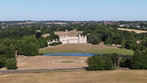 People playing cricket at copped hall in essex Stock Footage 340962745
