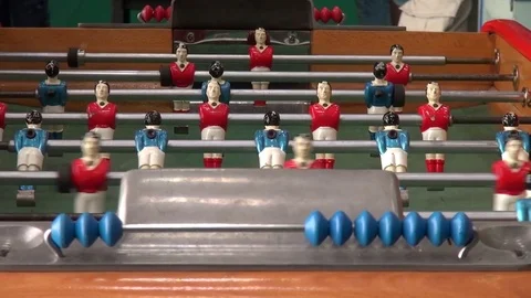 People playing foosball-keeping score at foosball table Stock Footage 71965858