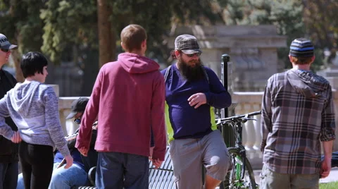 People playing hacky sack in the park.  Denver Colorado Stock Footage 53288144