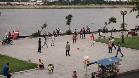 People playing hacky sack, River walk, Phnom Penh, Cambodia Stock Footage 92061017