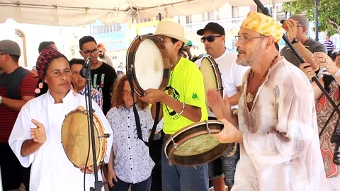 People Playing Instruments and Singing at Puertorican Bomba y Plena Festival Stock Footage 219644734