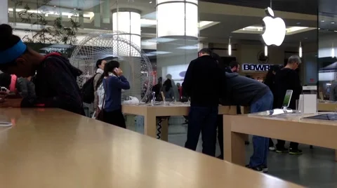 People playing new iphone inside Apple store 스톡 동영상 54051609