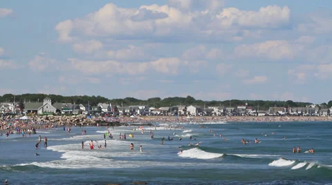 People playing in the ocean Stock Footage 33823770