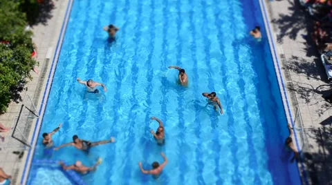 People playing in the pool Stock Footage