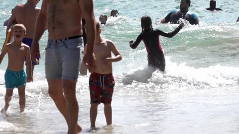 People playing in the sea Stock Footage 94406983