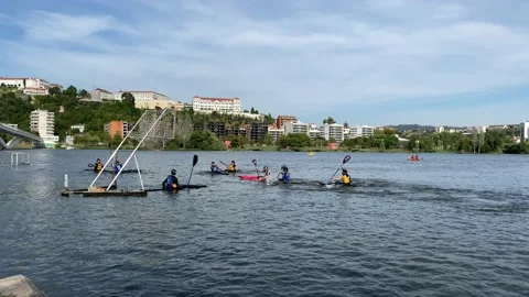 People playing water sports on river Stock Footage